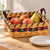 Square Fruit with Leather Handles wood-splint basket in Navy and Burgundy, lifestyle setting