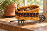 Wheel Barrow wood-splint basket in Navy and Burgundy, lifestyle setting